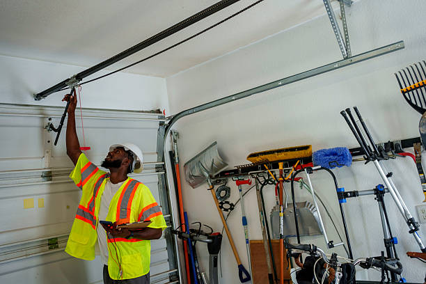 Professional Garage Door Panel Replacement technician working in Palisades Park, NJ